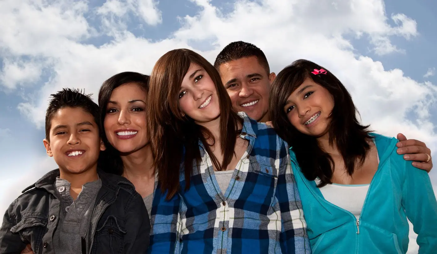 A group of people standing next to each other.